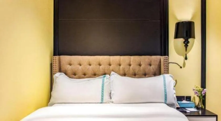 Bed in Xana Hotelle Beijing Olympic Park South Lishuiqiao Metro Station