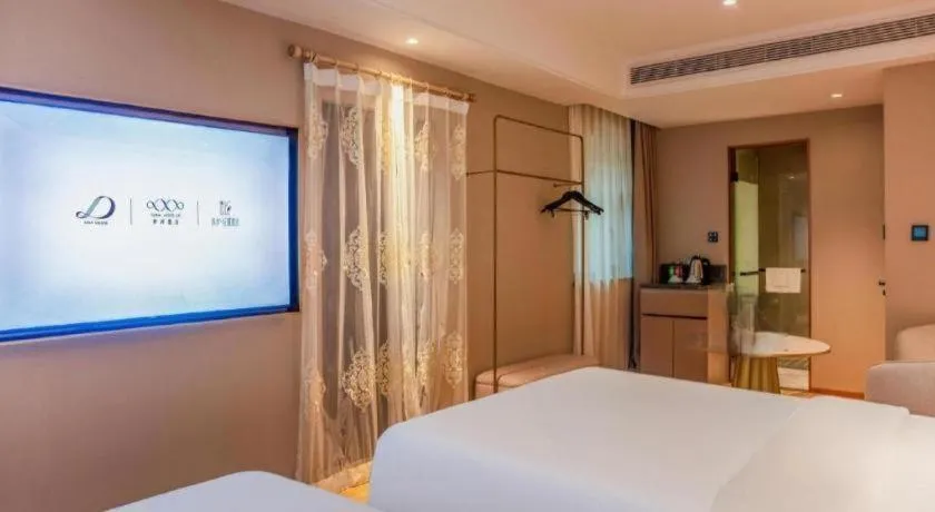 Bed in Xana Hotelle Beijing Olympic Park South Lishuiqiao Metro Station