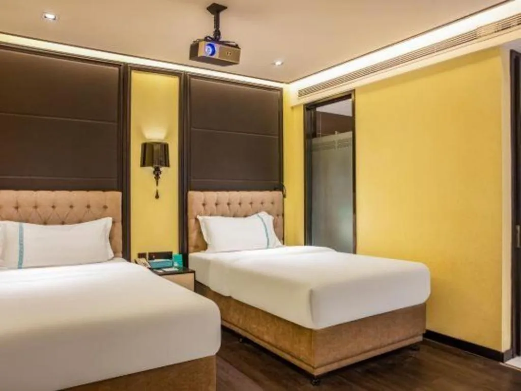 Bed in Xana Hotelle Beijing Olympic Park South Lishuiqiao Metro Station