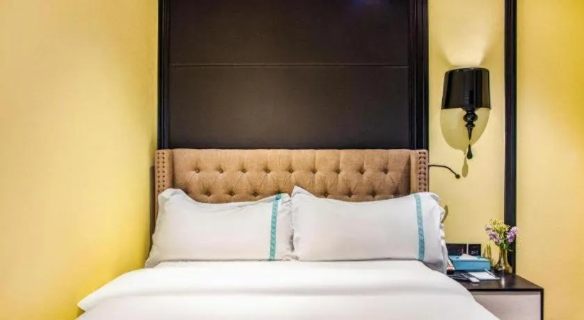 Bed in Xana Hotelle Beijing Olympic Park South Lishuiqiao Metro Station