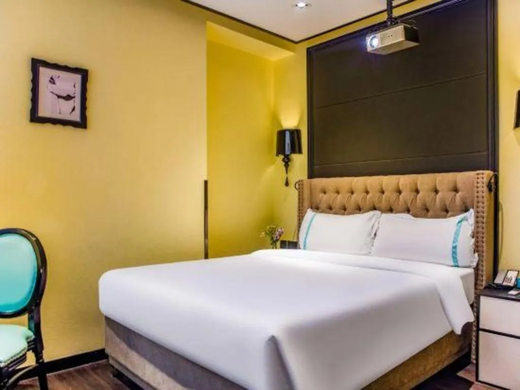 Bed in Xana Hotelle Beijing Olympic Park South Lishuiqiao Metro Station