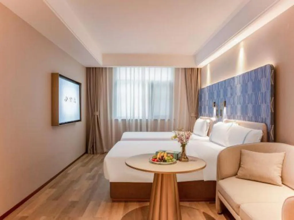 Bed in Xana Hotelle Beijing Olympic Park South Lishuiqiao Metro Station