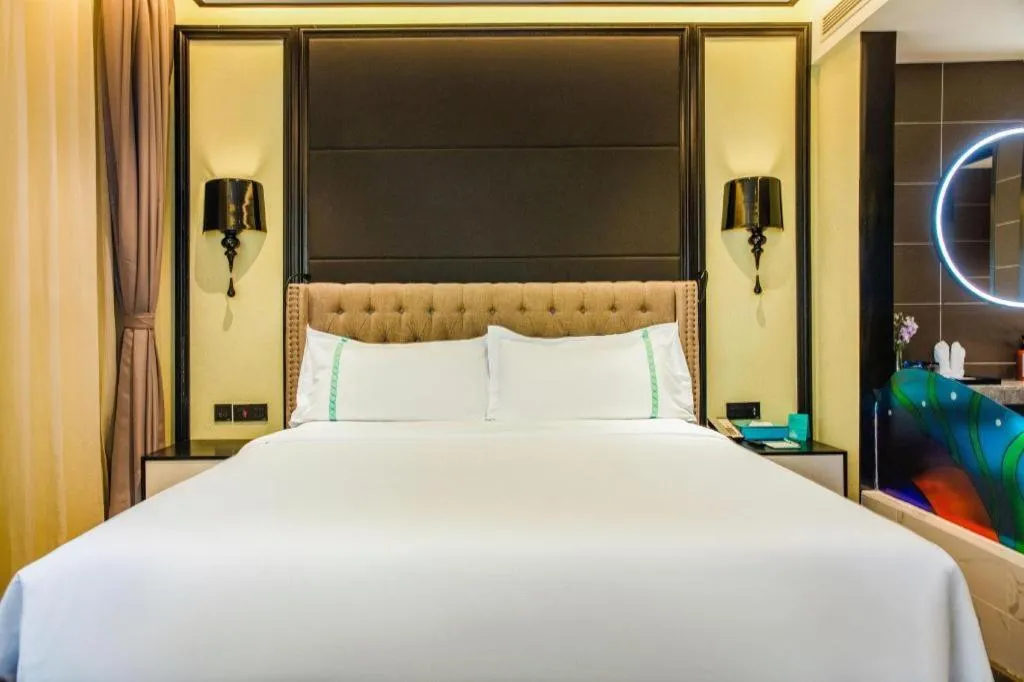 Bed in Xana Hotelle Beijing Olympic Park South Lishuiqiao Metro Station