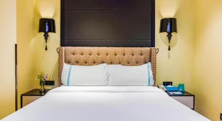 Bed in Xana Hotelle Beijing Olympic Park South Lishuiqiao Metro Station