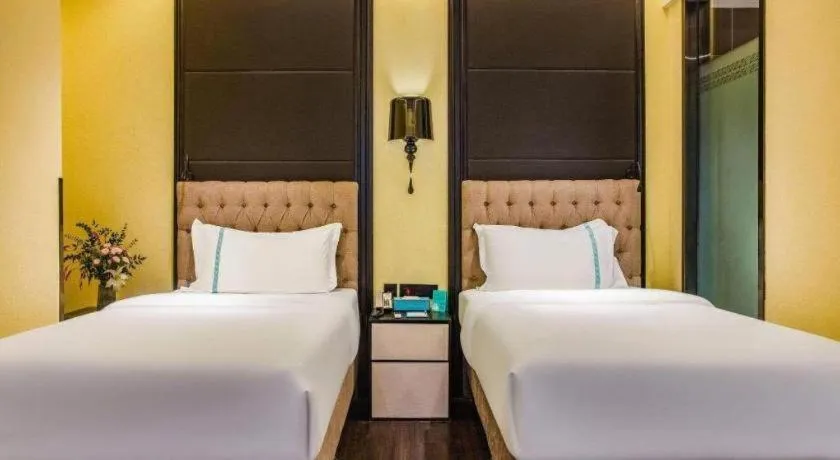 Bed in Xana Hotelle Beijing Olympic Park South Lishuiqiao Metro Station