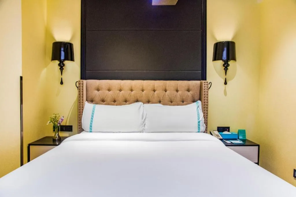 Bed in Xana Hotelle Beijing Olympic Park South Lishuiqiao Metro Station