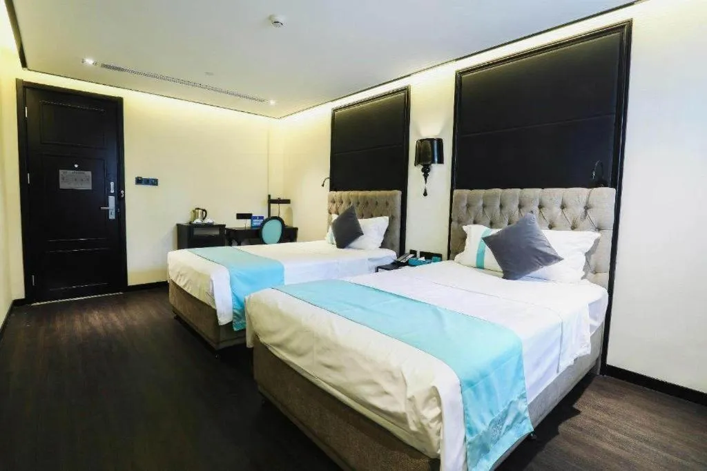 Bed in Xana Hotelle Beijing Olympic Park South Lishuiqiao Metro Station