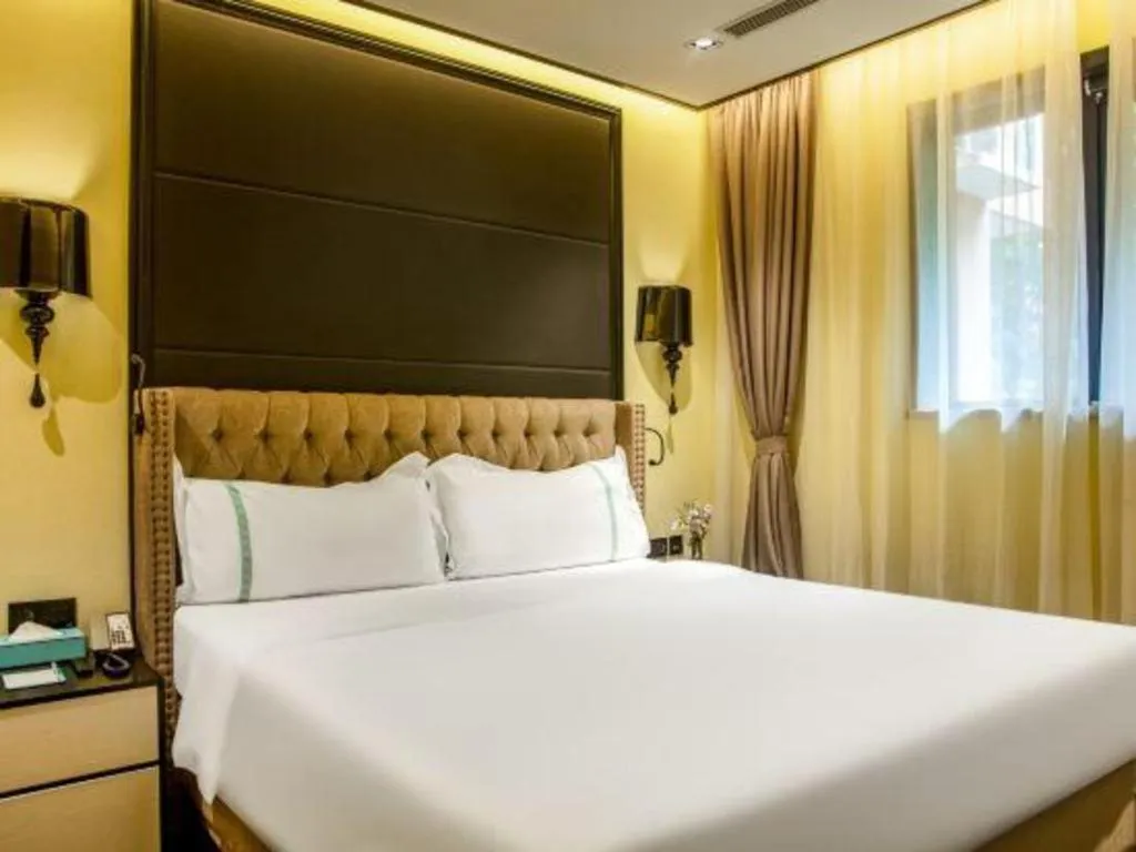 Bed in Xana Hotelle Beijing Olympic Park South Lishuiqiao Metro Station