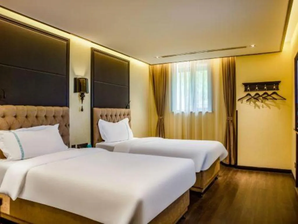 Bed in Xana Hotelle Beijing Olympic Park South Lishuiqiao Metro Station