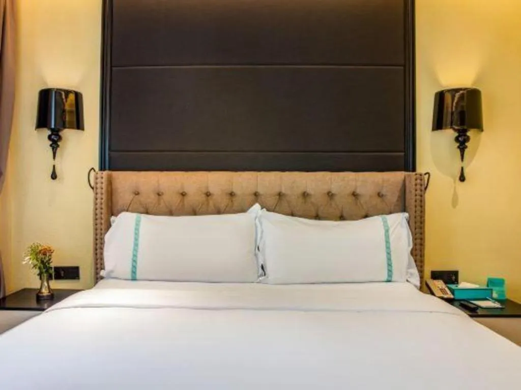 Bed in Xana Hotelle Beijing Olympic Park South Lishuiqiao Metro Station