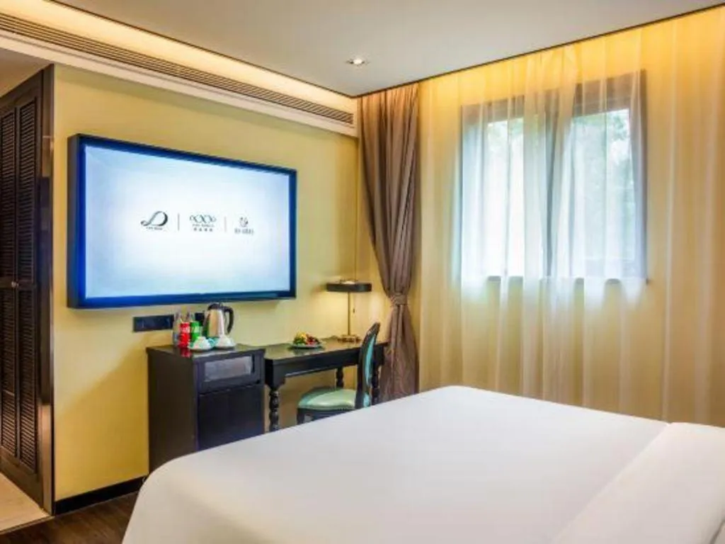 Bed in Xana Hotelle Beijing Olympic Park South Lishuiqiao Metro Station