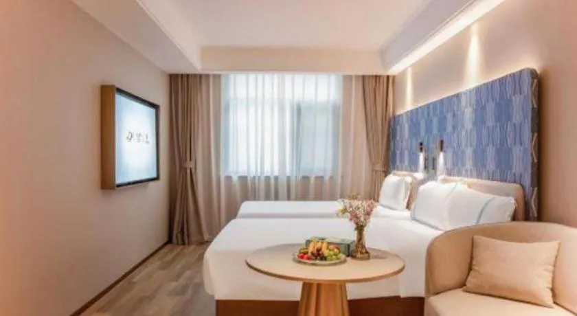 Bed in Xana Hotelle Beijing Olympic Park South Lishuiqiao Metro Station