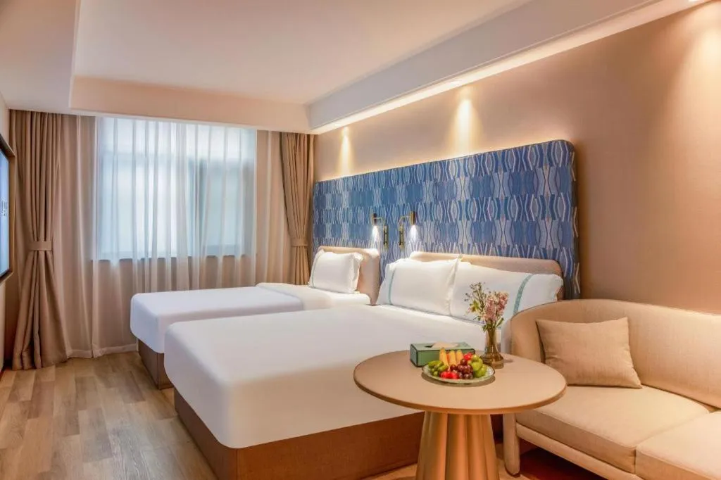 Bed in Xana Hotelle Beijing Olympic Park South Lishuiqiao Metro Station