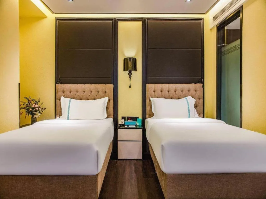 Bed in Xana Hotelle Beijing Olympic Park South Lishuiqiao Metro Station