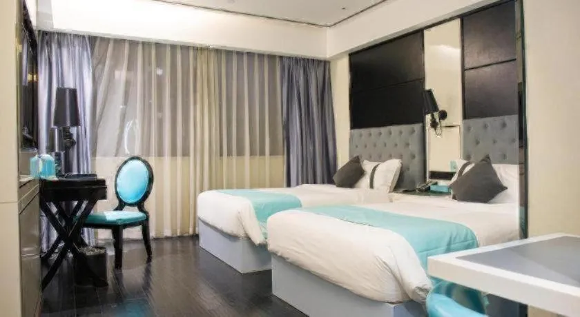 Bed in Xana Hotelle Neijiang City Center Branch