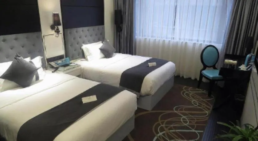 Bed in Xana Hotelle Neijiang City Center Branch
