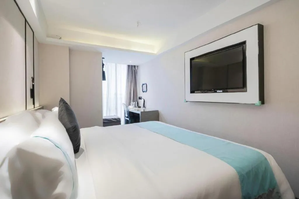 Bed in Xana Lite Guiyang Huaguoyuan Shuangzi Towers