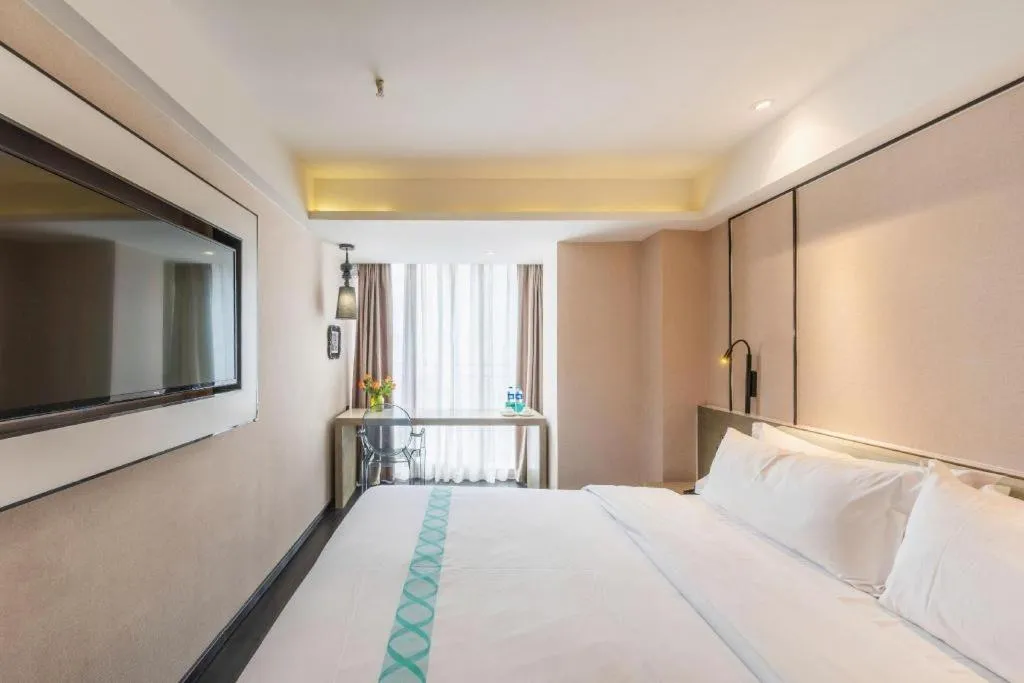 Bed in Xana Lite Guiyang Huaguoyuan Shuangzi Towers