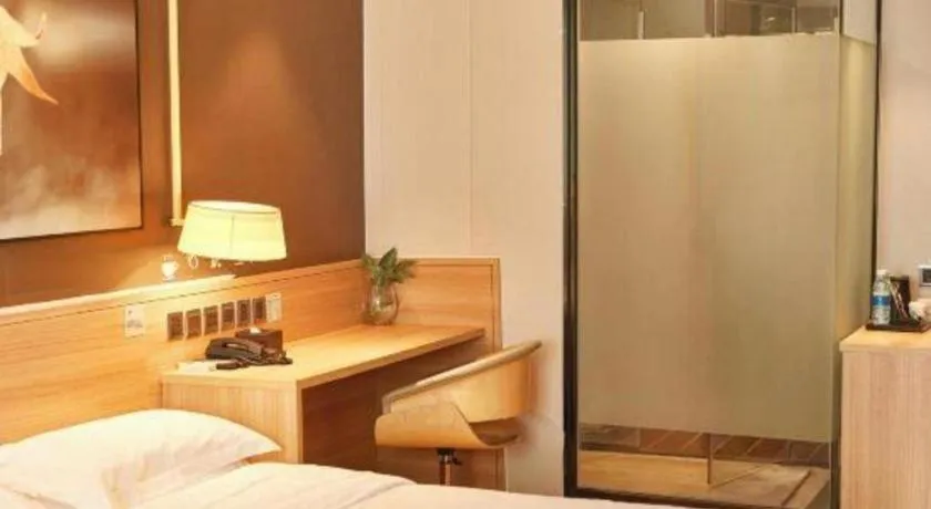 Bed in IU Hotel Chengdu Jianyang Xiongzhou Plaza