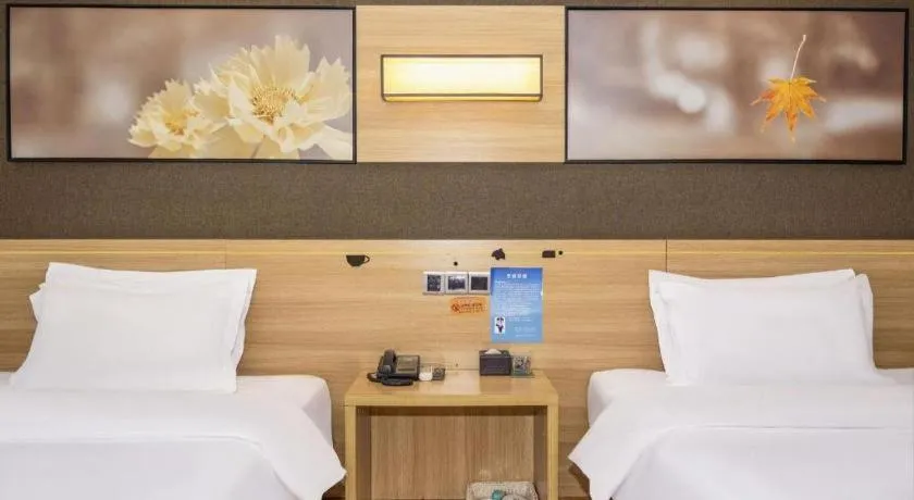 Bed in IU Hotel Chongqing Jiangbei International Airport