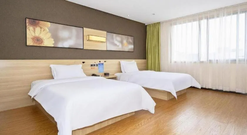 Bed in IU Hotel Chongqing Jiangbei International Airport