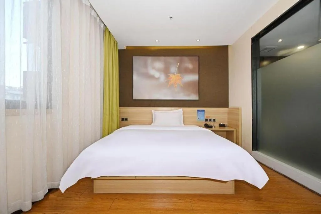 Bed in IU Hotel Chongqing Jiangbei International Airport