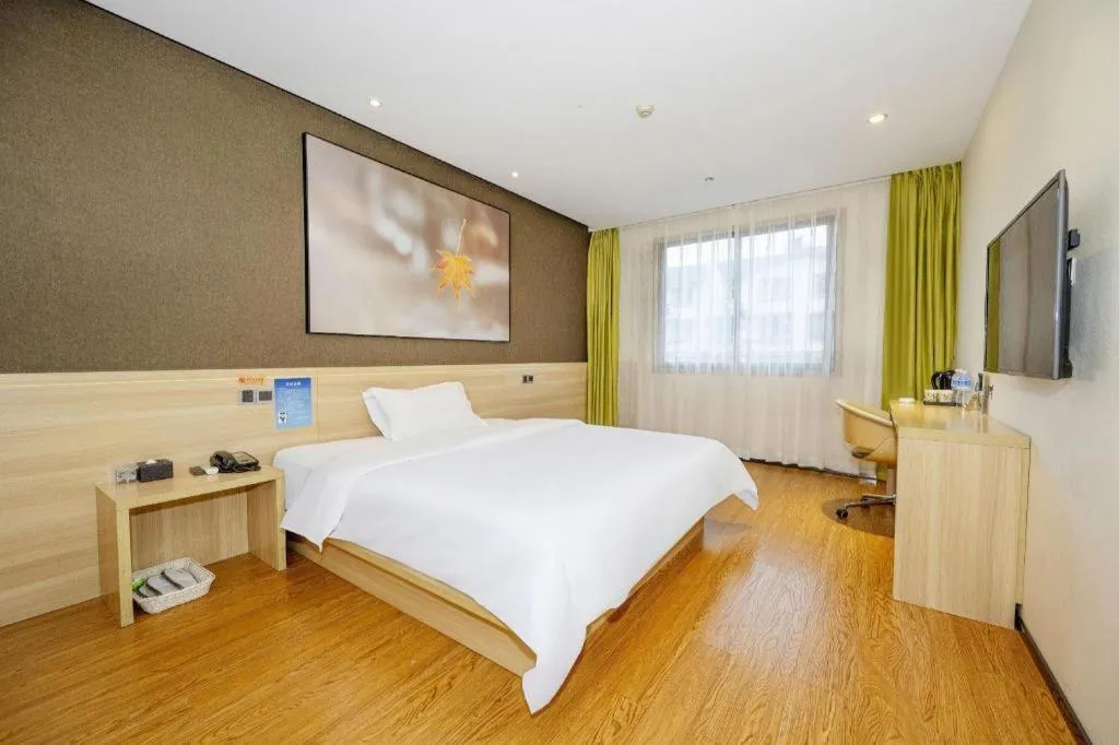 Bed in IU Hotel Chongqing Jiangbei International Airport