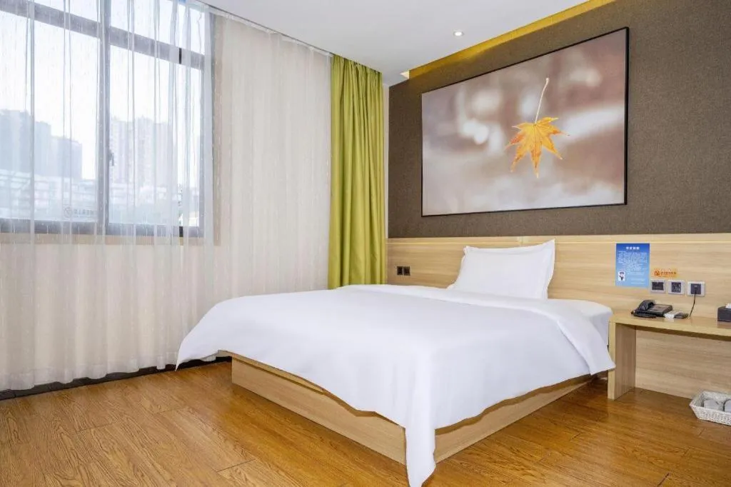 Bed in IU Hotel Chongqing Jiangbei International Airport