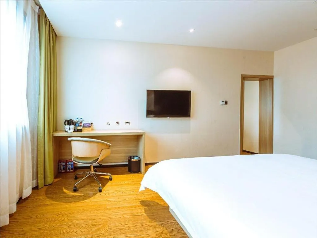 Bed in IU Hotel Chongqing Jiangbei International Airport