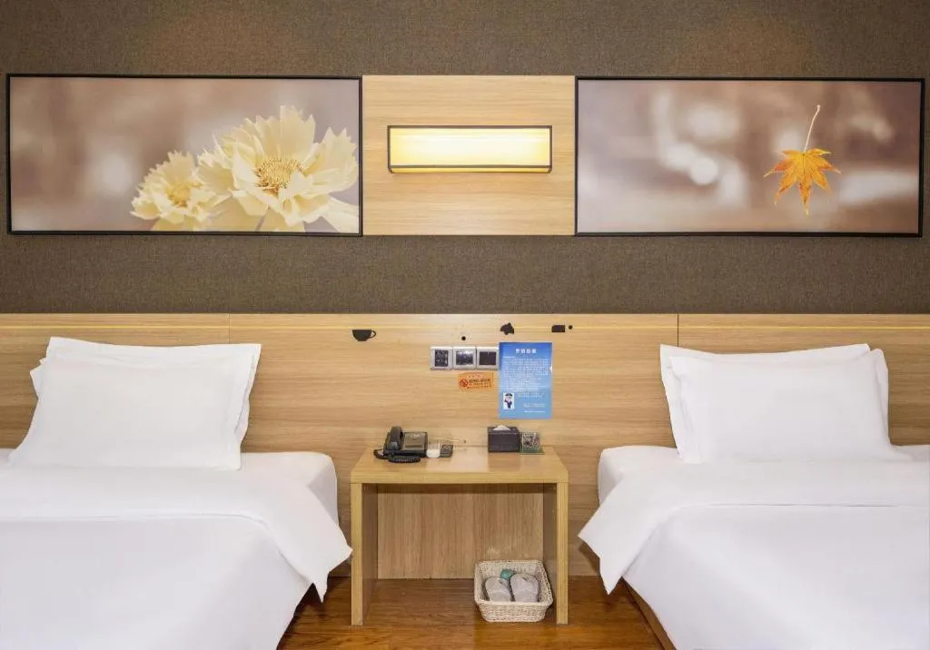 Bed in IU Hotel Chongqing Jiangbei International Airport