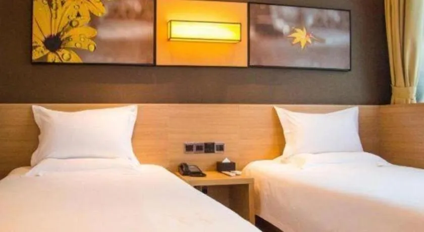 Bed in IU Hotel Chongqing Jiangbei International Airport