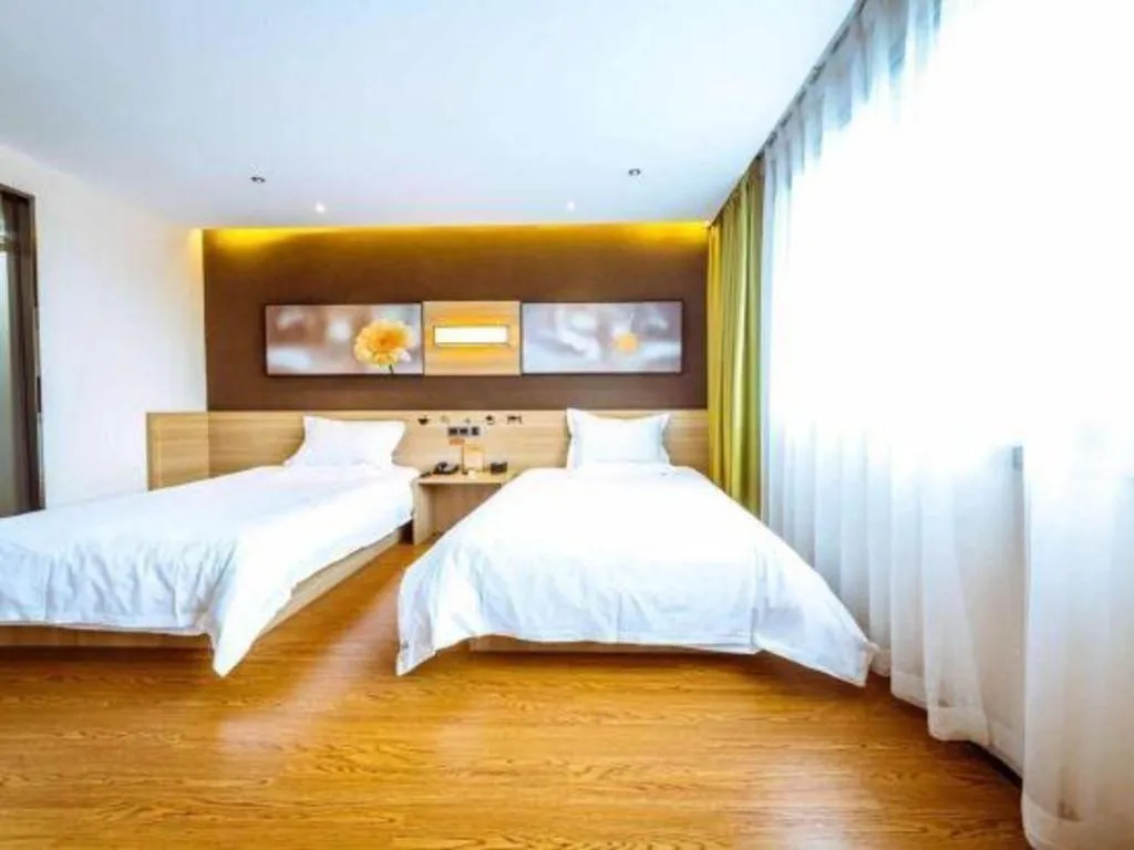 Bed in IU Hotel Chongqing Jiangbei International Airport