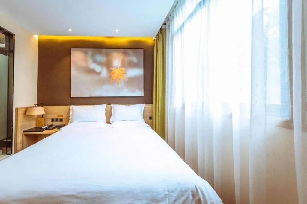 Bed in IU Hotel Chongqing Jiangbei International Airport