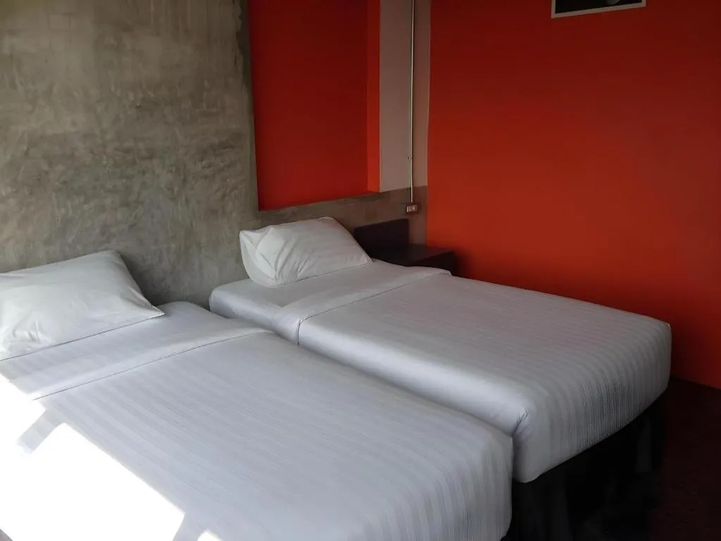 Bed in Pornsiri Hotel Sisaket