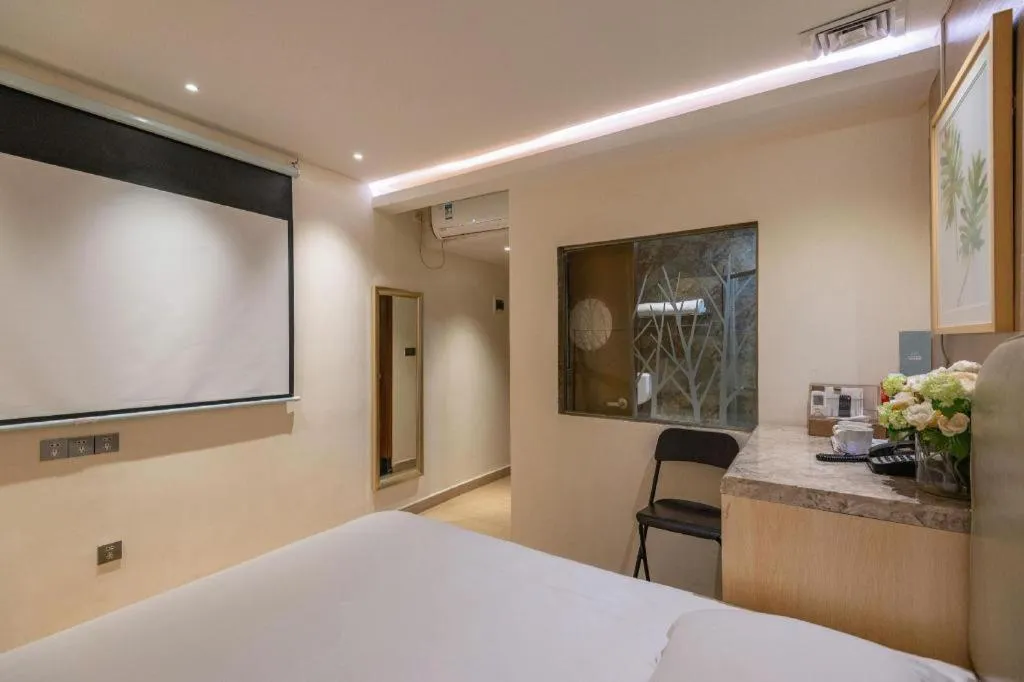 Bed in Leisurely Hotel Shenzhen