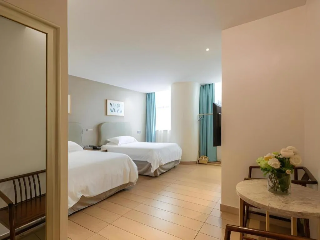 Bed in Leisurely Hotel Shenzhen