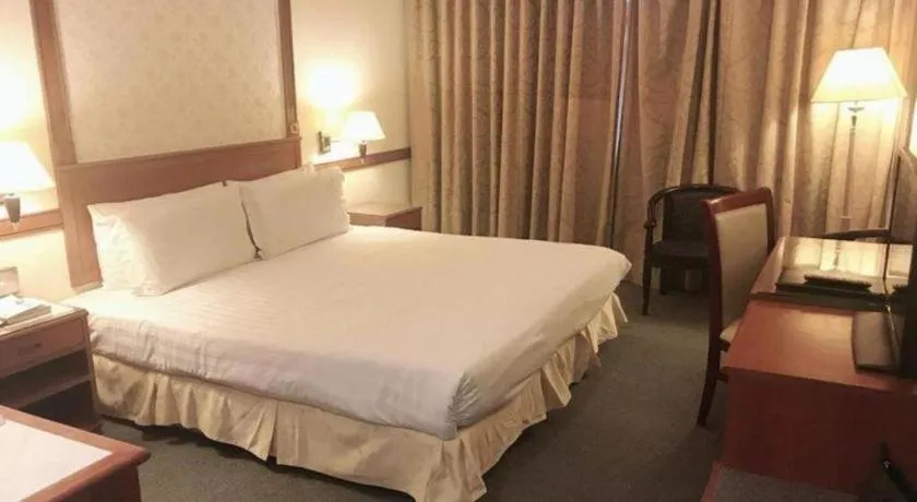 Bed in Grand City Hotel