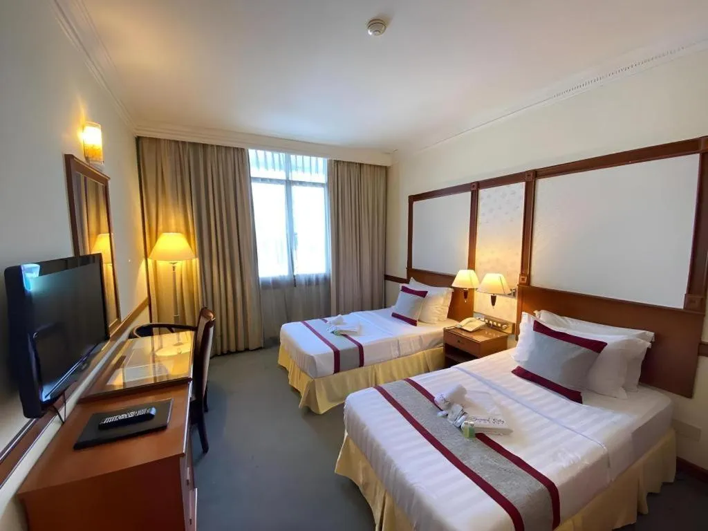 Bed in Grand City Hotel