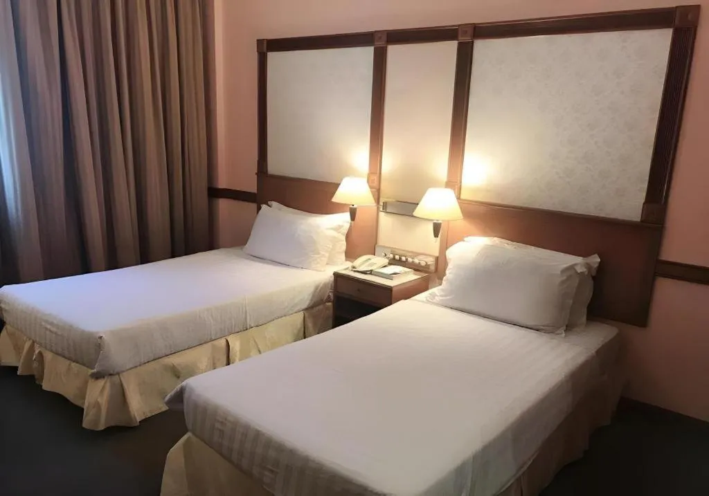 Bed in Grand City Hotel