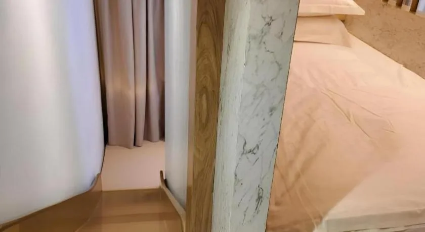 Bed in Grand City Hotel