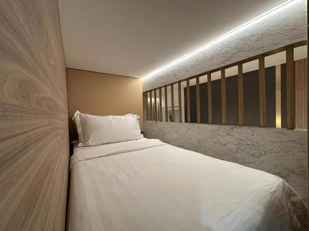 Bed in Grand City Hotel