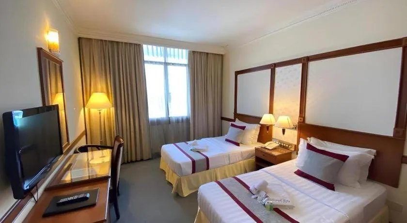 Bed in Grand City Hotel