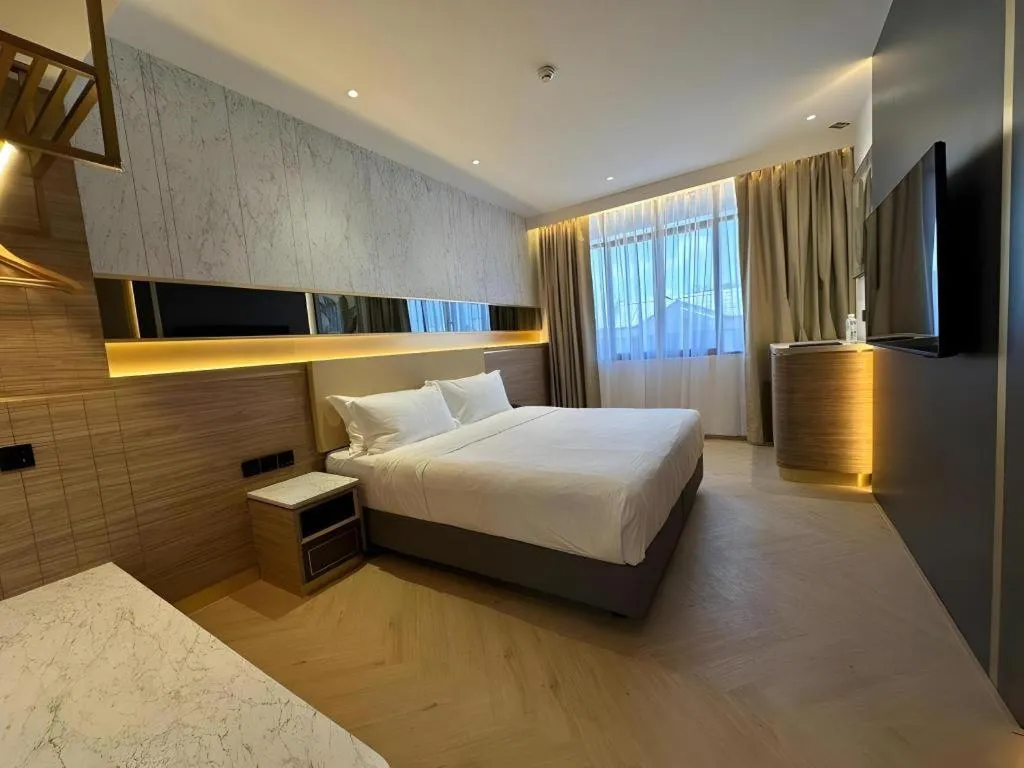 Bed in Grand City Hotel