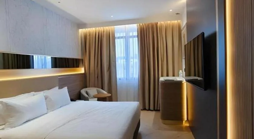 Bed in Grand City Hotel