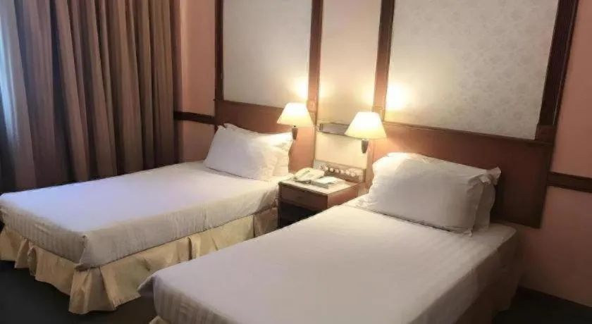Bed in Grand City Hotel