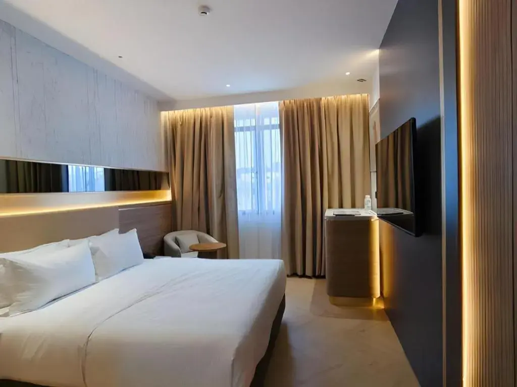 Bed in Grand City Hotel Bed in Grand City Hotel