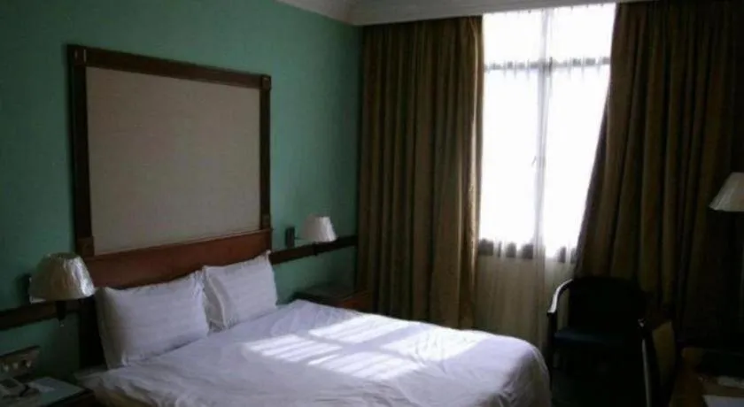 Bed in Grand City Hotel