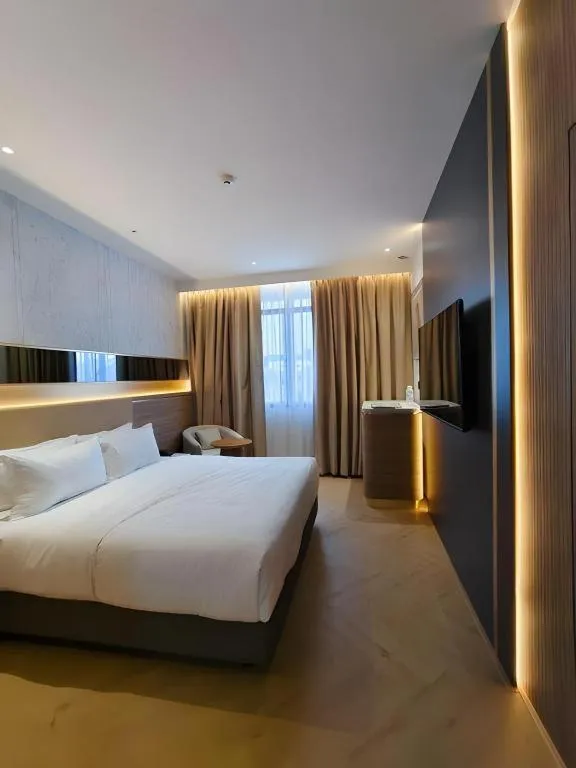 Bed in Grand City Hotel