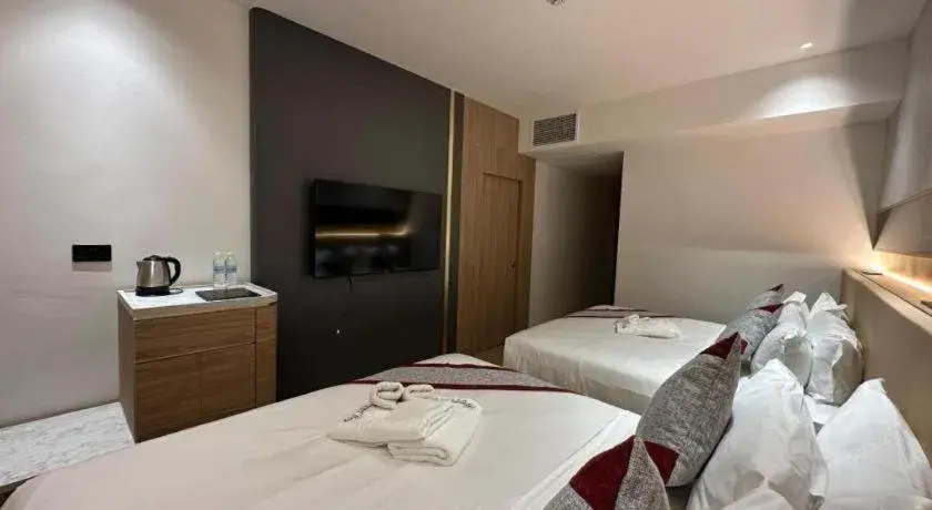 Bed in Grand City Hotel Bed in Grand City Hotel