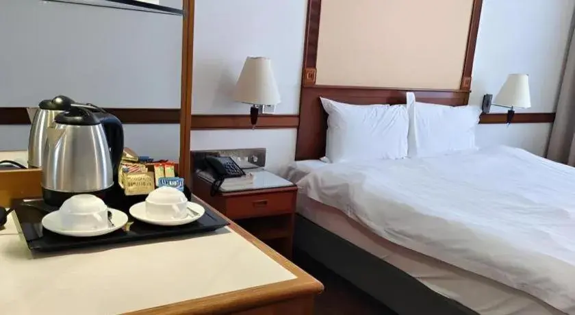 Bed in Grand City Hotel Bed in Grand City Hotel